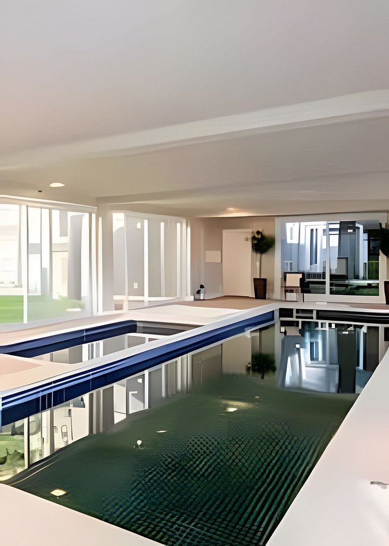 Charmoso Apto com piscina aquecida e lareira.