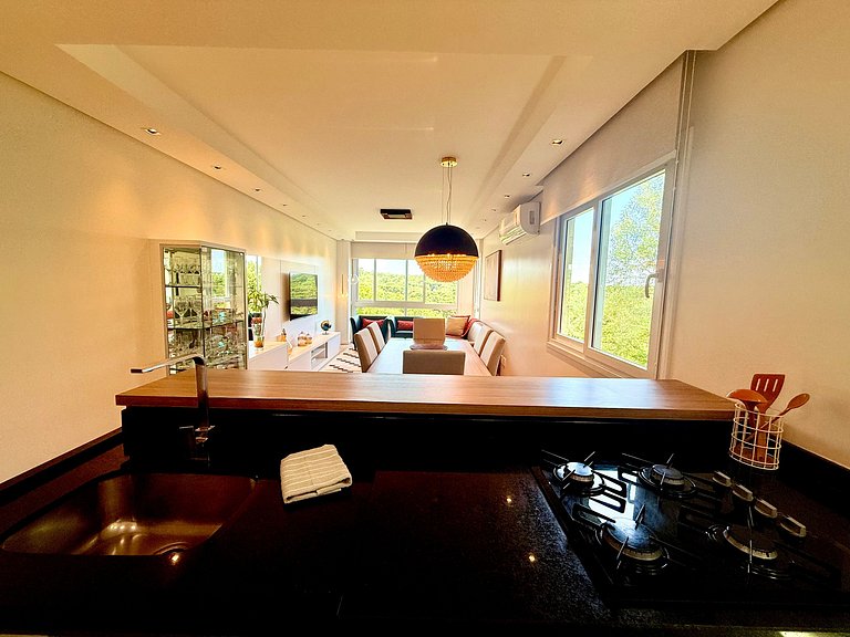 2 Suítes • Vista Sunset • 5min Centro