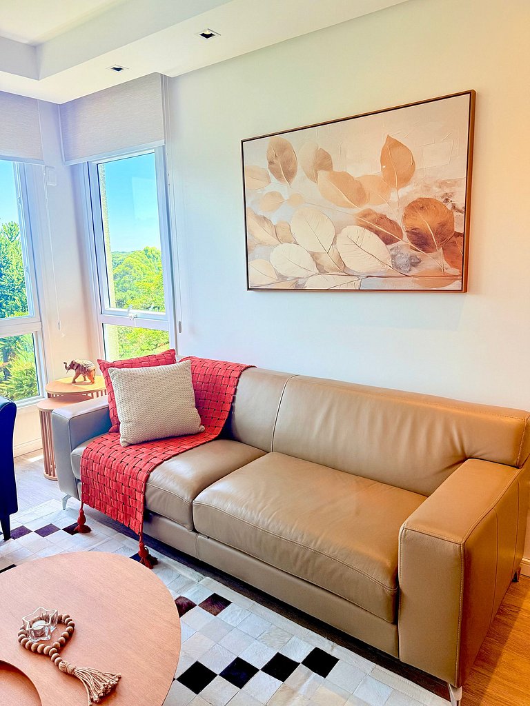 2 Suítes • Vista Sunset • 5min Centro