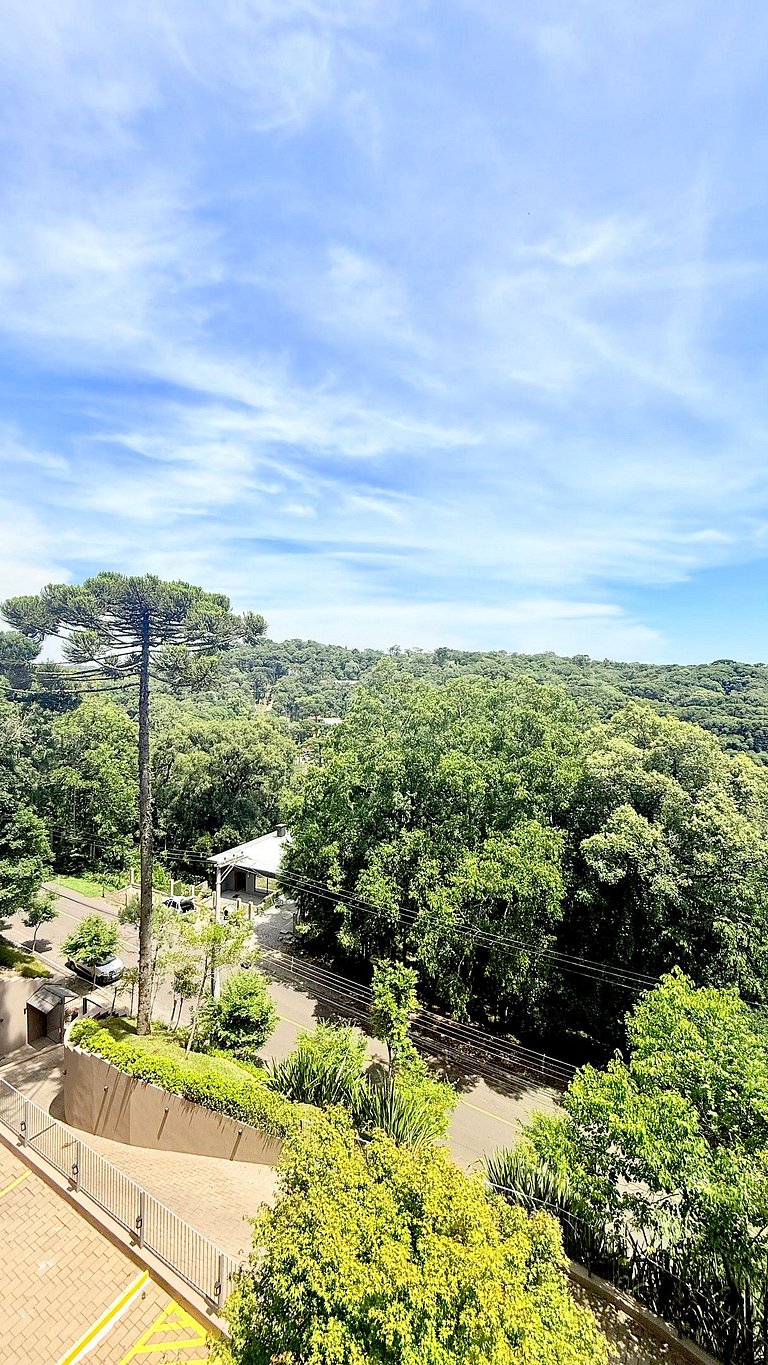 2 Suítes • Vista Sunset • 5min Centro