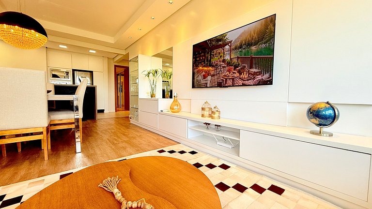 2 Suítes • Vista Sunset • 5min Centro