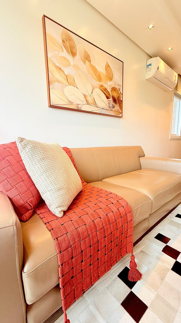 2 Suítes • Vista Sunset • 5min Centro