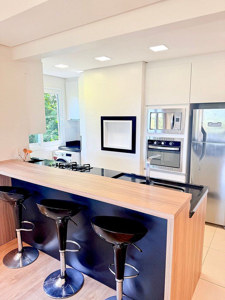 2 Suítes • Vista Sunset • 5min Centro