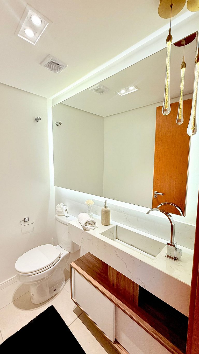 2 Suítes • Vista Sunset • 5min Centro