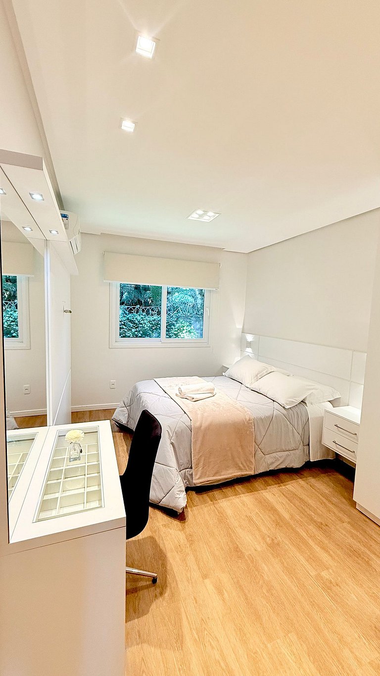 2 Suítes • Vista Sunset • 5min Centro